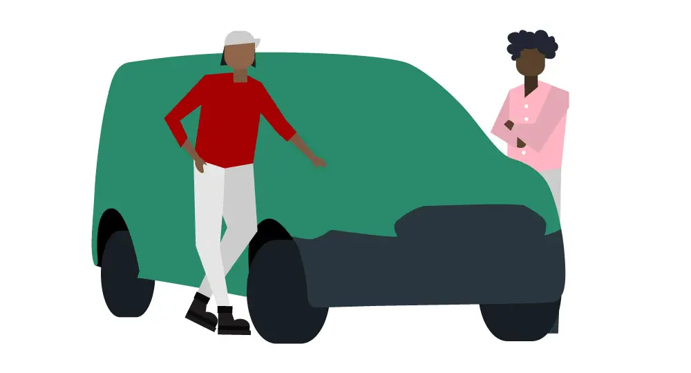 Two people stand next to a green vehicle. One person, wearing a red shirt and white cap, leans on the car, whilst the other, in a pink shirt, stands with arms folded.